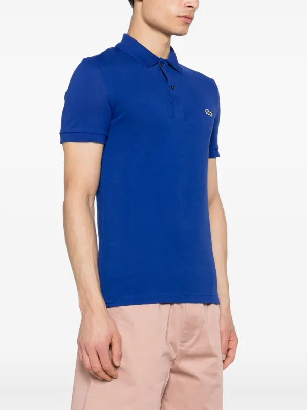 Lacoste
logo-patch cotton polo shirt